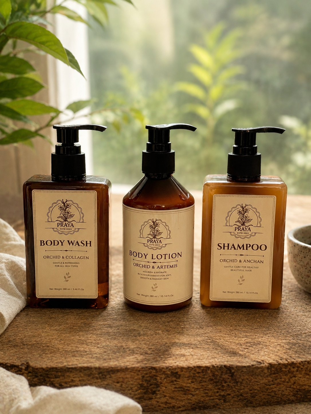 PRAYA Body Wash, Body Lotion and Shampoo collection on a wooden tray